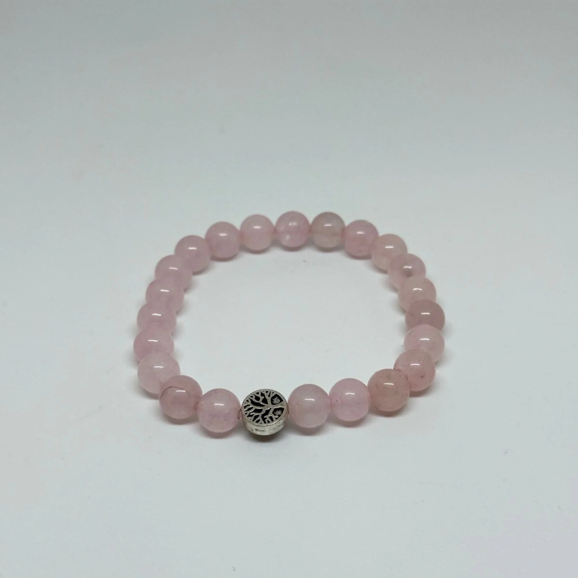 Rose Quartz bracelet for unconditional love, emotional healing, heart harmony, compassion, inner peace, and amplified heart energy with Star Codes.